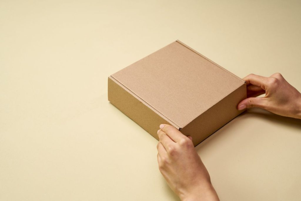 Unboxing a compressed sofa after delivery